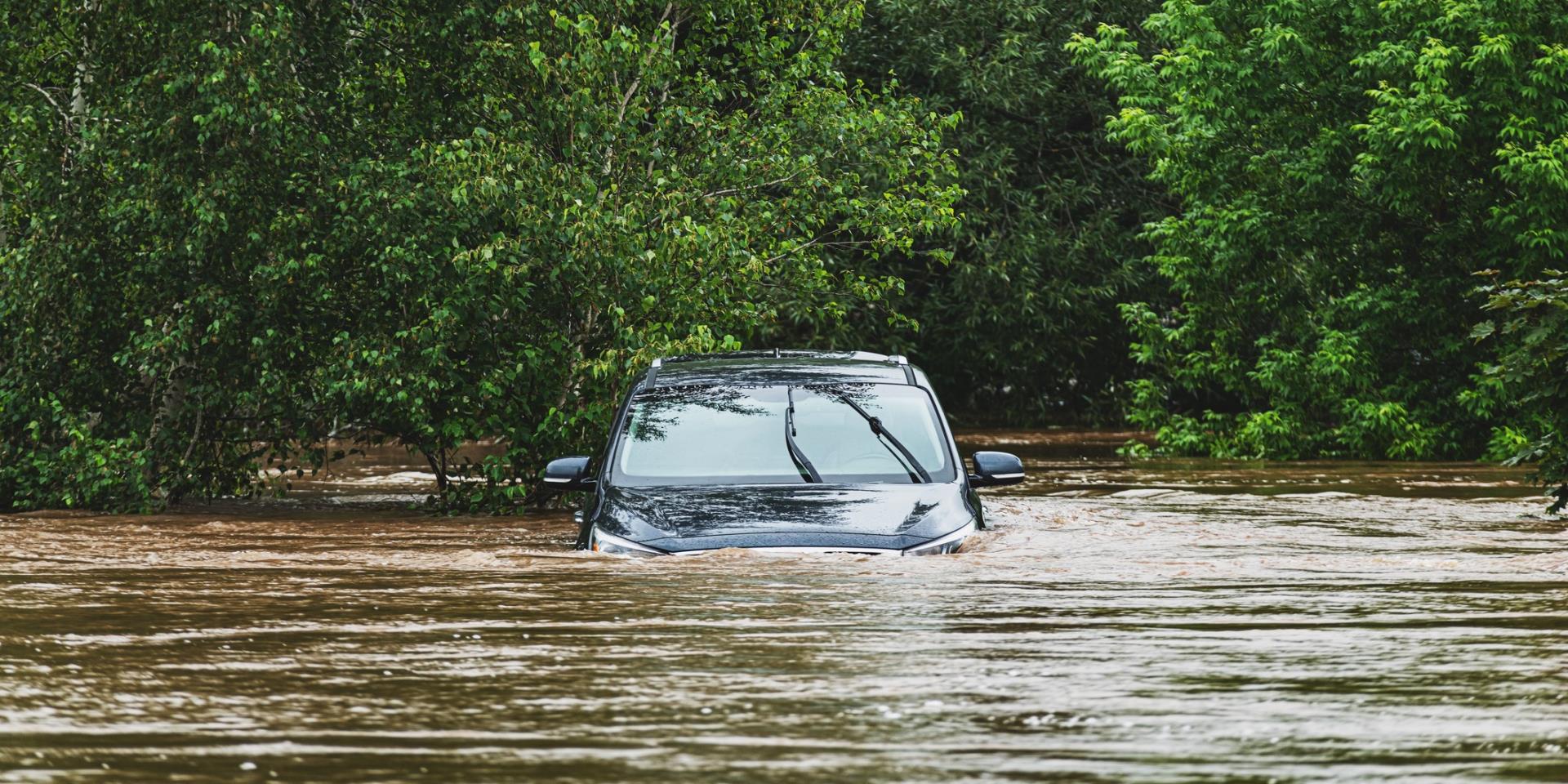 car stuck in flood waters