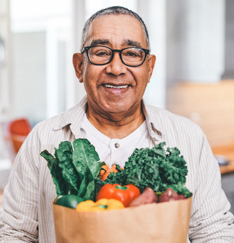 cropped man with veggies