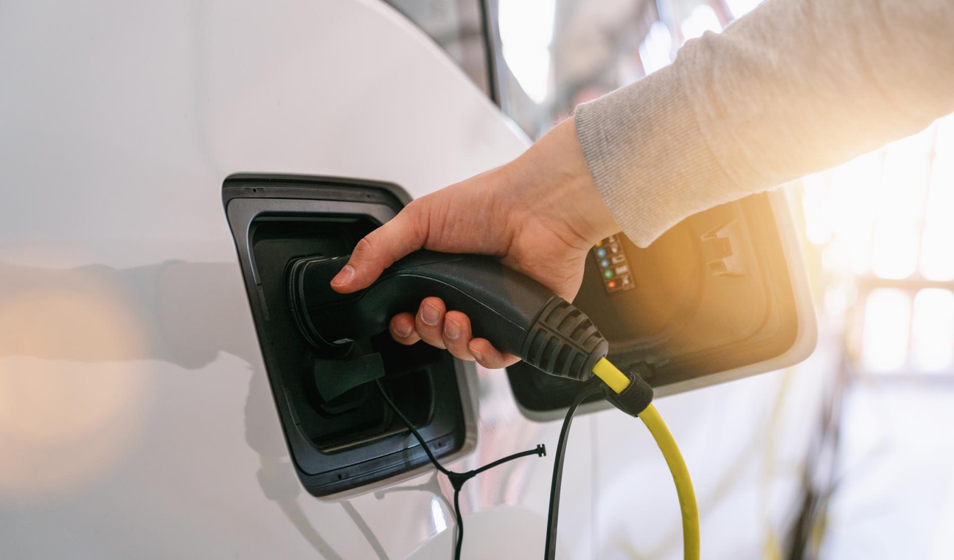 Plugging in electric vehicle